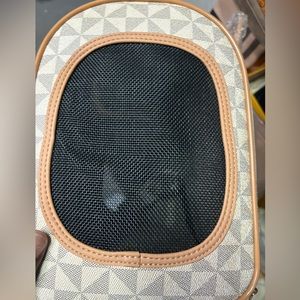 New Michael Kors dog carrier still has tags on it